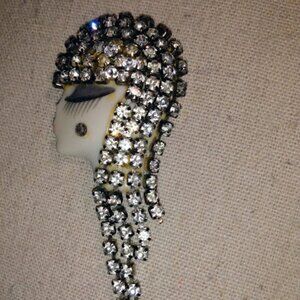 Vintage art deco rhinestone lady head flapper brooch.